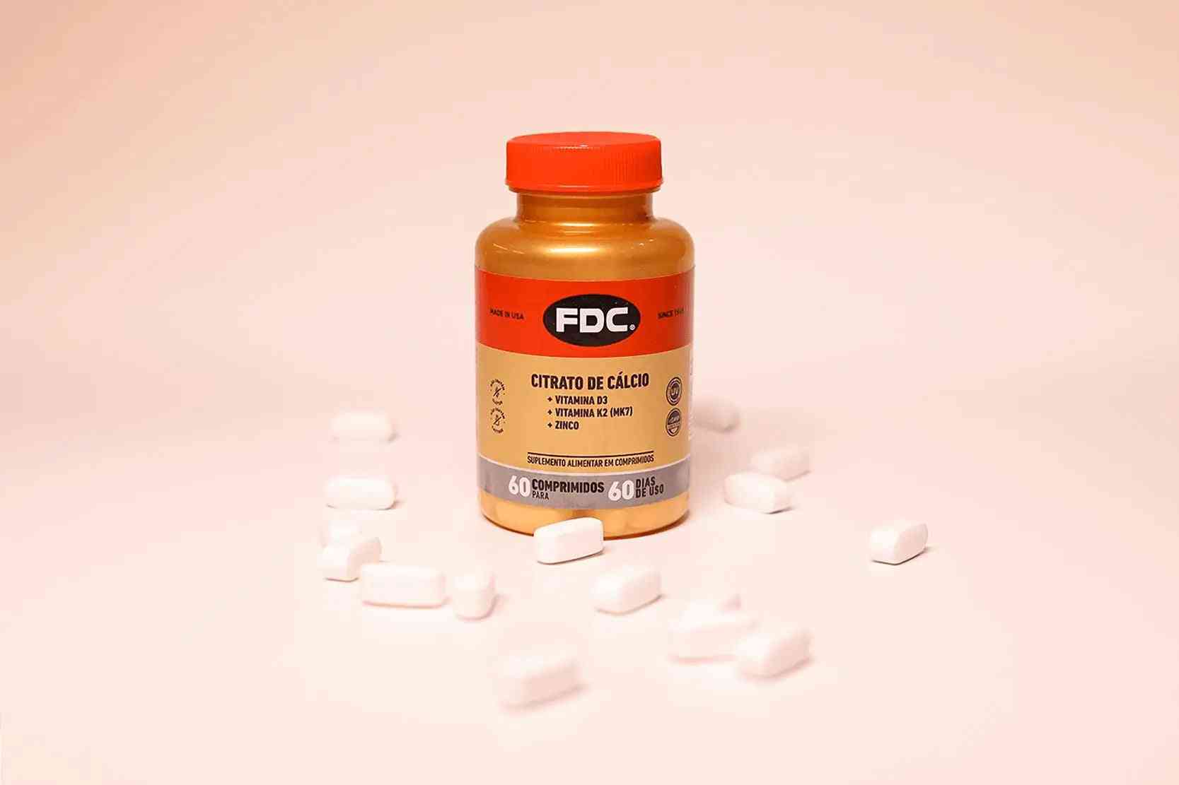 a bottle of foc vitamins sitting on top of a table