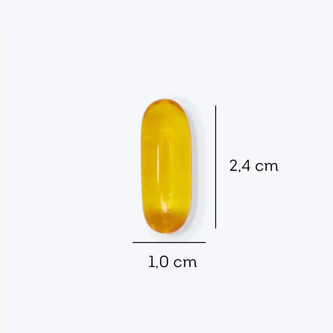 a yellow pill pill with measurements for it