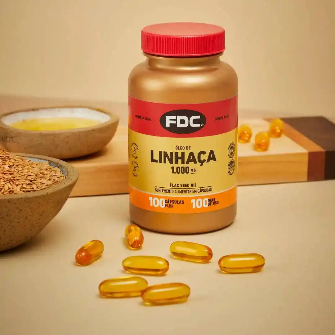 a bottle of linhaca next to a bowl of oats