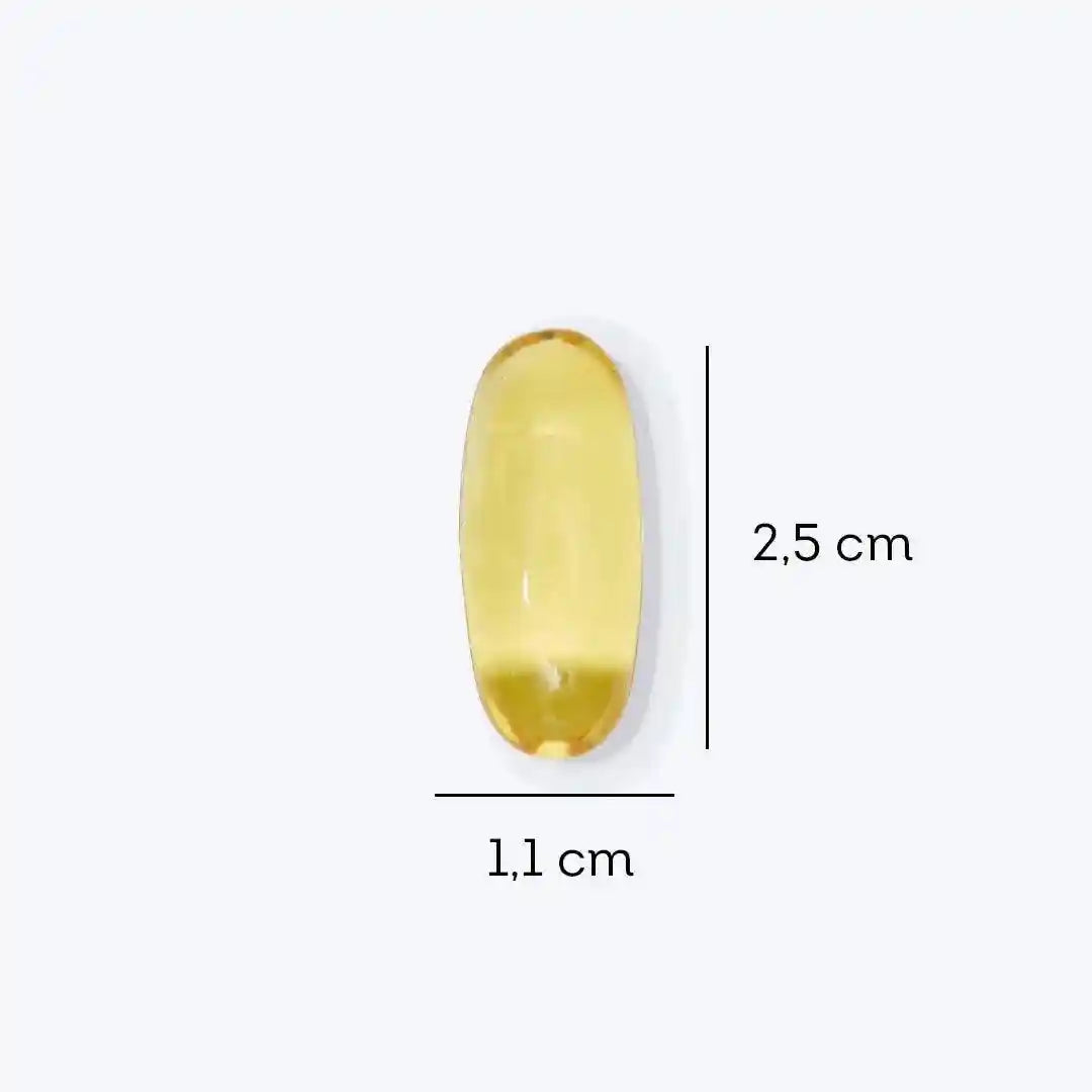a yellow oval shaped glass bead on a white background